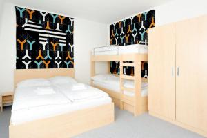 Camera con 2 letti a castello. di Penzion Kraličák a Staré Město