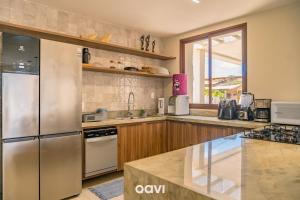 Køkken eller tekøkken på Villa Makani no Shamballa by Qavi