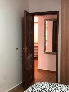 Ένα ή περισσότερα κρεβάτια σε δωμάτιο στο Rosslyn