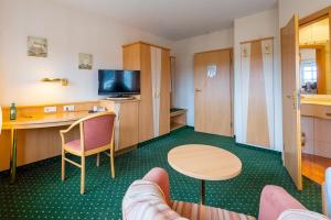 Μια τηλεόραση ή/και κέντρο ψυχαγωγίας στο STEINHOFF Hotel und Gastronomie