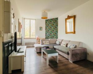 Χώρος καθιστικού στο Magnifique duplex 3 chambres proche centre-ville et gare Chemin du Barrage