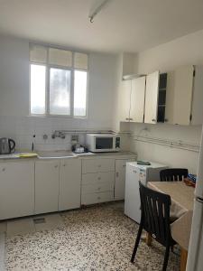 Η κουζίνα ή μικρή κουζίνα στο Central apartment with beautiful view