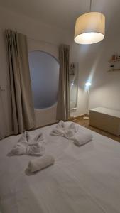 Ένα ή περισσότερα κρεβάτια σε δωμάτιο στο 659A by R2R Apartmento céntrico para 3 personas