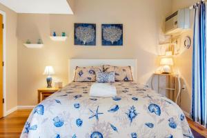 En eller flere senge i et værelse på Sand & Surf at Wells Beach