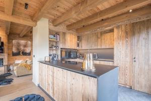 Η κουζίνα ή μικρή κουζίνα στο Chalet Combloux Luxury