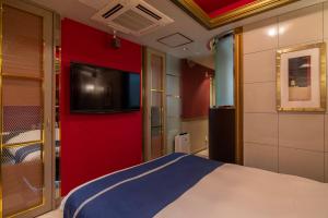 Кровать или кровати в номере Charme, Romantic Hideaway in Central Tokyo