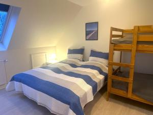 Ένα ή περισσότερα κρεβάτια σε δωμάτιο στο Oasen Samsø +75 φωτογραφίες