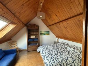 Ένα ή περισσότερα κρεβάτια σε δωμάτιο στο Albatros House Fort-Mahon-Plage