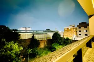 a view of a city from a balcony at Studio Pérola – Conforto, modernidade prox a UFU! in Uberlândia