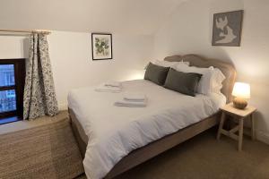 En eller flere senge i et værelse på Old Grocers Shop, Youlgrave