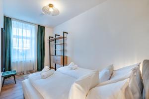 Ένα ή περισσότερα κρεβάτια σε δωμάτιο στο Downtown Apartments by Cosy Homes - Bahnhofsnähe
