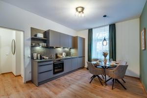 Η κουζίνα ή μικρή κουζίνα στο Downtown Apartments by Cosy Homes - Bahnhofsnähe