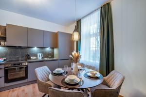 Η κουζίνα ή μικρή κουζίνα στο Downtown Apartments by Cosy Homes - Bahnhofsnähe