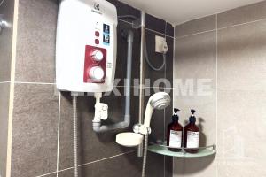 a soap dispenser on the wall of a bathroom at NETFLIX-Pinnacle PJ, Fantastic City View, 1-6 Guests Designed Duplex Home by Flexihome-MY in Petaling Jaya +103 photos