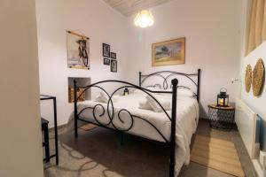 Postel nebo postele na pokoji v ubytování Stella's Country House