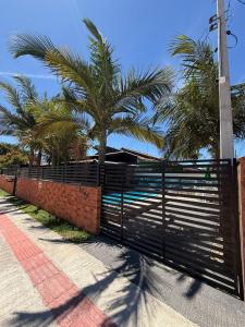 Πισίνα στο ή κοντά στο Cantinho das Palmeiras em Itapoá- Casa c piscina p 6 pessoas