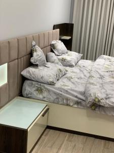 Una cama o camas en una habitación de The apartment is two complete rooms