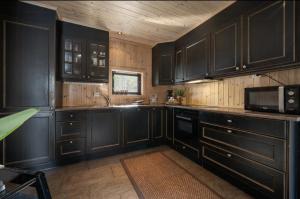 Η κουζίνα ή μικρή κουζίνα στο Family Cabin By The River In Hovden