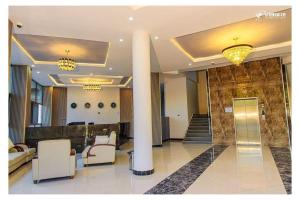 Χώρος καθιστικού στο Daros International Hotel