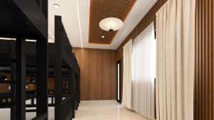 a hallway with wood paneling and a ceiling at Cloudy Nandy Hills Poombarai in Kūkkāl