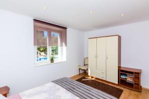 Ένα ή περισσότερα κρεβάτια σε δωμάτιο στο Villa Oasis Cypress