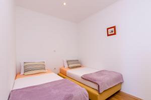 Ένα ή περισσότερα κρεβάτια σε δωμάτιο στο Villa Oasis Cypress