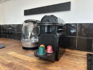 a blender sitting on top of a counter at L'âme de Nice - Terrasse dorée sur Place Masséna in Nice