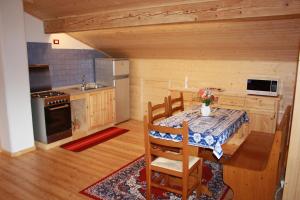 Kuchyň nebo kuchyňský kout v ubytování Albergo Diffuso Faller