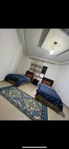 Postel nebo postele na pokoji v ubytování Gani2