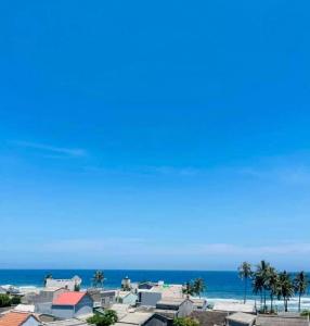 a view of the beach and the ocean at Khách Sạn - Homestay QUANG VINH Đảo Lý Sơn in Ly Son