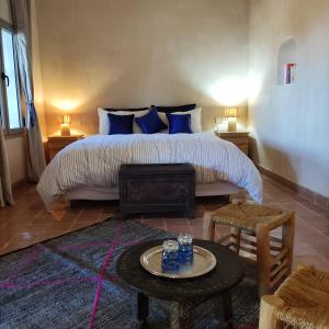 En eller flere senge i et værelse på Tigmi N'Dounit Lodge et Nature