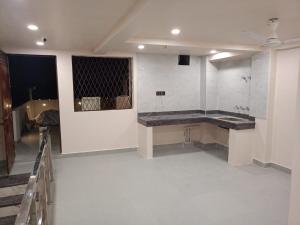 a bathroom with a counter in a room at Hotel Grand C & G at Central Delhi New Delhi in Jāmb +47 photos
