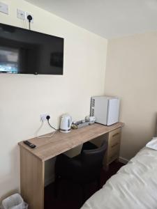 Kuchyň nebo kuchyňský kout v ubytování The Granby Rooms