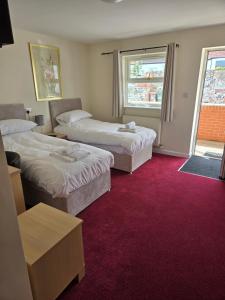 Postel nebo postele na pokoji v ubytování The Granby Rooms