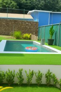 Piscina de la sau aproape de Casa Colibrí Playa Blanca +14 fotografii