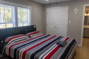 Ένα ή περισσότερα κρεβάτια σε δωμάτιο στο Beautiful Home Centrally Located