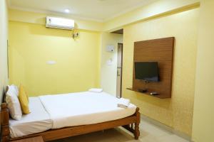 Μια τηλεόραση ή/και κέντρο ψυχαγωγίας στο Hotel Baga Grande