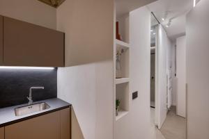 Kuchyň nebo kuchyňský kout v ubytování Grigio Perla Mondovi