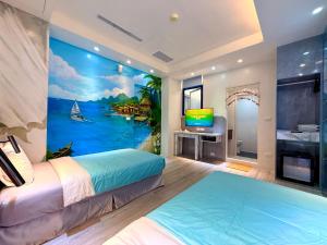 a bedroom with a mural of a boat in the water at 船屋親子特色民宿Ship House in Xiaoliuqiu