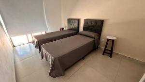 Ένα ή περισσότερα κρεβάτια σε δωμάτιο στο Piccolo Posto