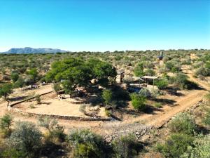 an old house in the middle of the desert at BellaTiny Campsite with camping cabin for 4 in Windhoek