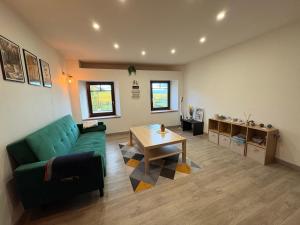 Posezení v ubytování Au cœur du vignoble Alsacien + 13 fotografií