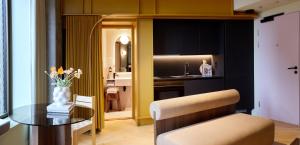 Rúm í herbergi á Locke Copenhagen