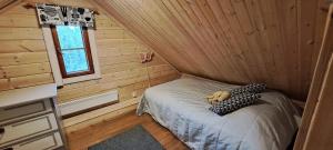 En eller flere senge i et værelse på Vanamo