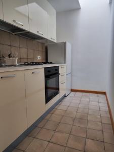 Η κουζίνα ή μικρή κουζίνα στο Al Portico 38