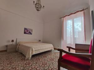 Ένα ή περισσότερα κρεβάτια σε δωμάτιο στο Al Portico 38 +10 φωτογραφίες