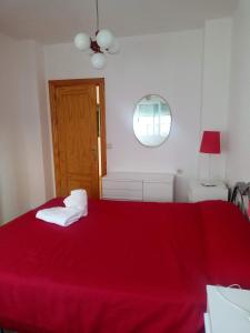 Postel nebo postele na pokoji v ubytování Casacuéntame