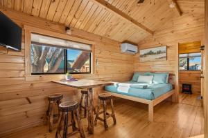 Et tv og/eller underholdning på Fruita Monument RV Park