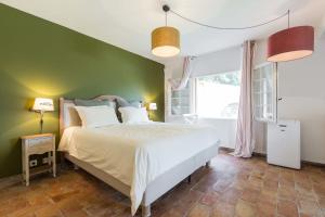 Ένα ή περισσότερα κρεβάτια σε δωμάτιο στο Luxury villa for 18 people with heated pool near Cannes