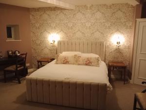 Ένα ή περισσότερα κρεβάτια σε δωμάτιο στο Whiston Hall